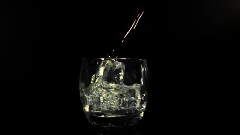 Juice-pouring-into-glass-in-super-slow-motion-