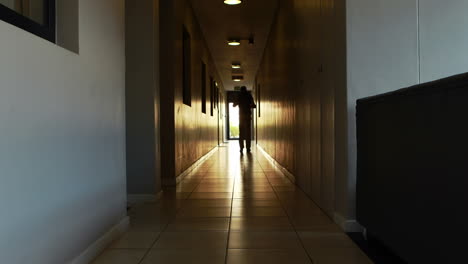 Patient-is-walking-in-corridor-