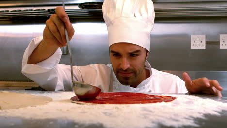 Chef-Preparando-Una-Pizza