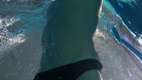 Underwater-view-of-man-swimming-and-diving