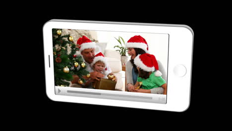 Smartphone-Mostrando-Familias-Celebrando-La-Navidad.