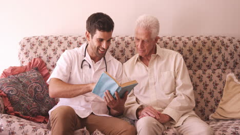 Male-doctor-and-senior-man-reading-a-book