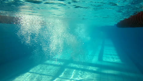 Underwater-view-of-man-swimming-and-diving