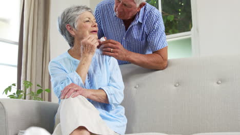 Senior-woman-crying-and-being-comfort-by-husband