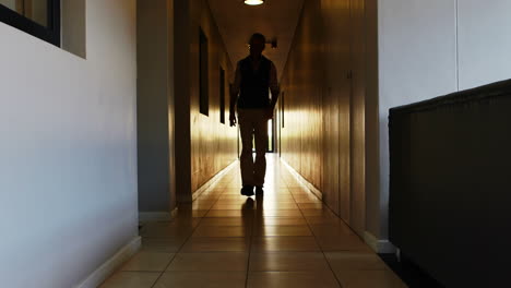 Patient-is-walking-in-corridor-
