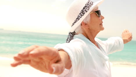 Senior-woman-with-arms-stretched-out