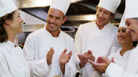 Gourmet-cook-applauding-their-colleague-