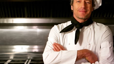 Portrait-of-chef-posing-in-commercial-kitchen