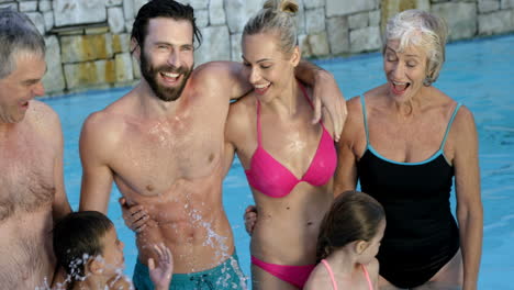 Cute-family-smiling-at-the-camera