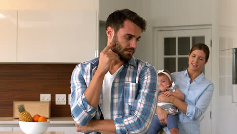 Thoughtful-father-in-kitchen