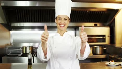 Pretty-chef-showing-thumbs-up