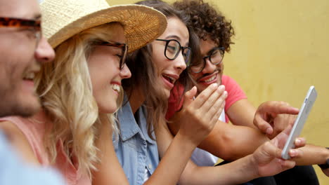 Friends-looking-at-smartphone