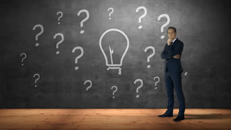 Businessman-standing-against-question-marks-and-bulb