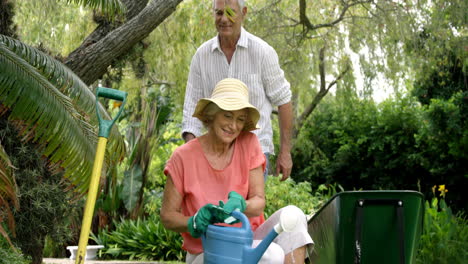 Happy-couple-gardening-together