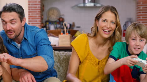 Family-playing-video-games-on-couch