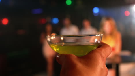 Close-up-of-hand-holding-cocktail