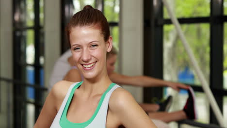 Four-athletic-women-and-men-stretching