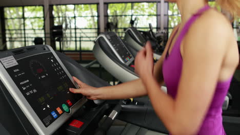 Fit-woman-running-on-treadmill