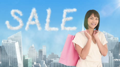 Smiling-woman-holding-shopping-bag