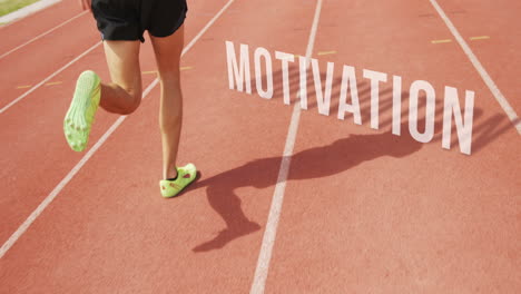 Athletic-man-running-with-the-word-motivation-on-the-floor