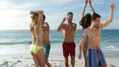 Friends-dancing-on-the-beach