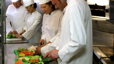 Cook-gourmets-preparing-a-salad