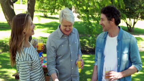 Man-doing-barbecue-for-family