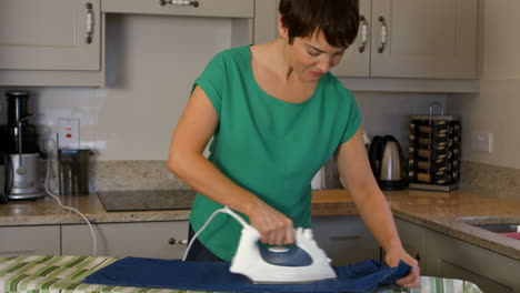 Woman-ironing-her-clothing