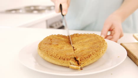 Woman-cutting-a-cake