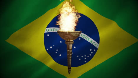 Olympic-torch-burning-against-Brazilian-flag