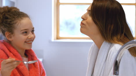 Daughter-feeding-breakfast-to-her-mother