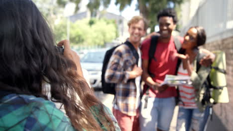 Woman-taking-photo-of-her-friends