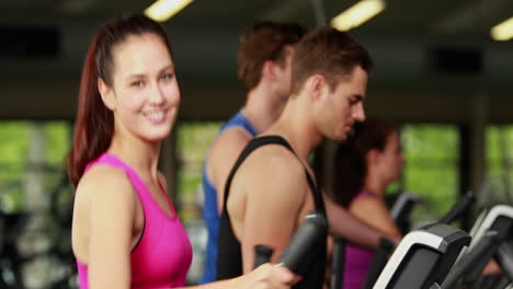 Fit-people-on-elliptical-bike