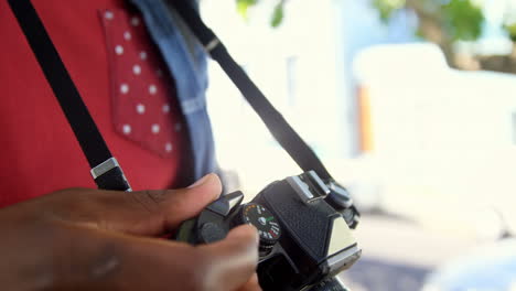 Close-up-of-hipster-is-using-a-camera-