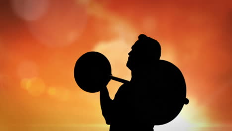 Silhouette-of-an-athlete-lifting-a-barbell