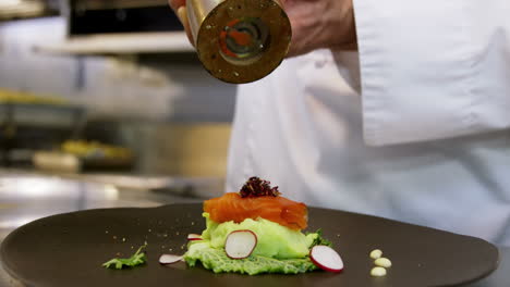 Chef-garnishing-a-salad