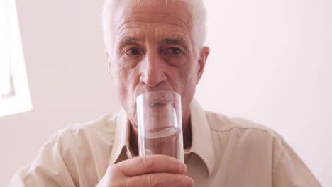 Senior-man-drinking-water