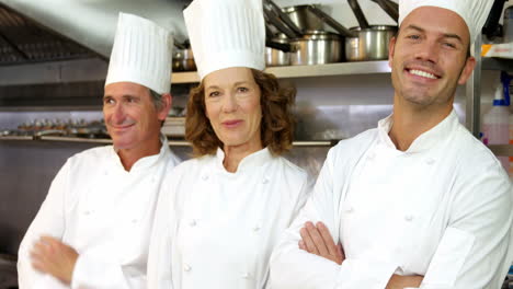 Three-chefs-smiling-at-the-camera