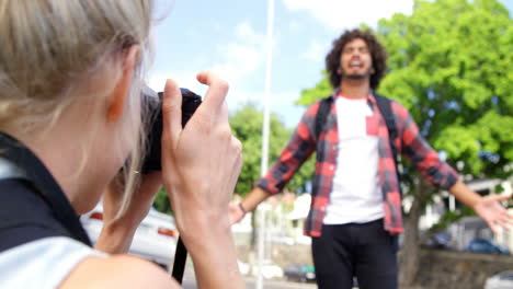 Woman-taking-photo-of-his-friends