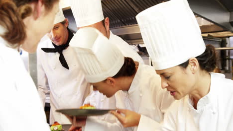 Team-of-chef-working-together-in-the-kitchen