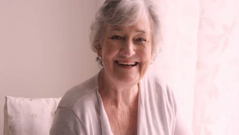 Senior-woman-smiling-at-home