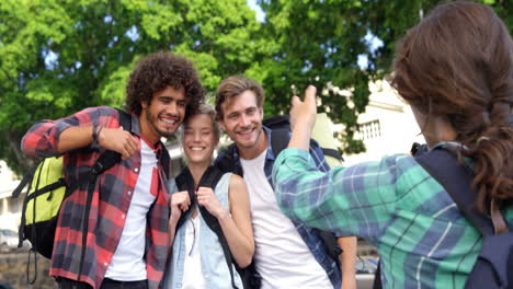 Woman-taking-photo-of-his-friends