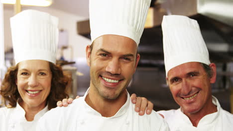 Three-chefs-smiling-at-the-camera