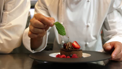 Chefs-putting-finishing-touch-on-desserts