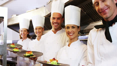 Team-of-chef-presenting-their-plate