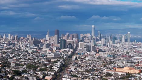 Drone-aerial-view-down-Market-Street-in-San-Francisco,-California