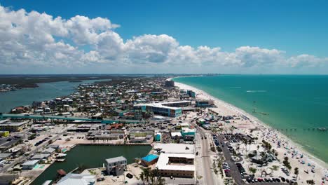 Drone-aerial-view-of-the-busy-beaches-in-Fort-Myers,-Florida