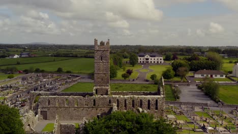 Claregalway-Friary-centered-in-aerial-orbit-hyperlapse-as-cloud-shadow-passes-ruins