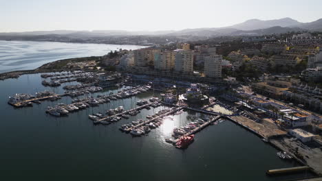 Marina-and-apartment-buildings-of-Estepona,-aerial-drone-view