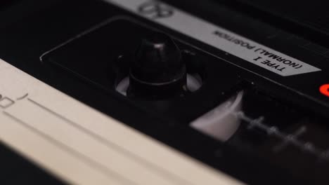 Inserting-and-Playing-Audio-Cassette-Tape-Recording-From-1980's,-Close-Up